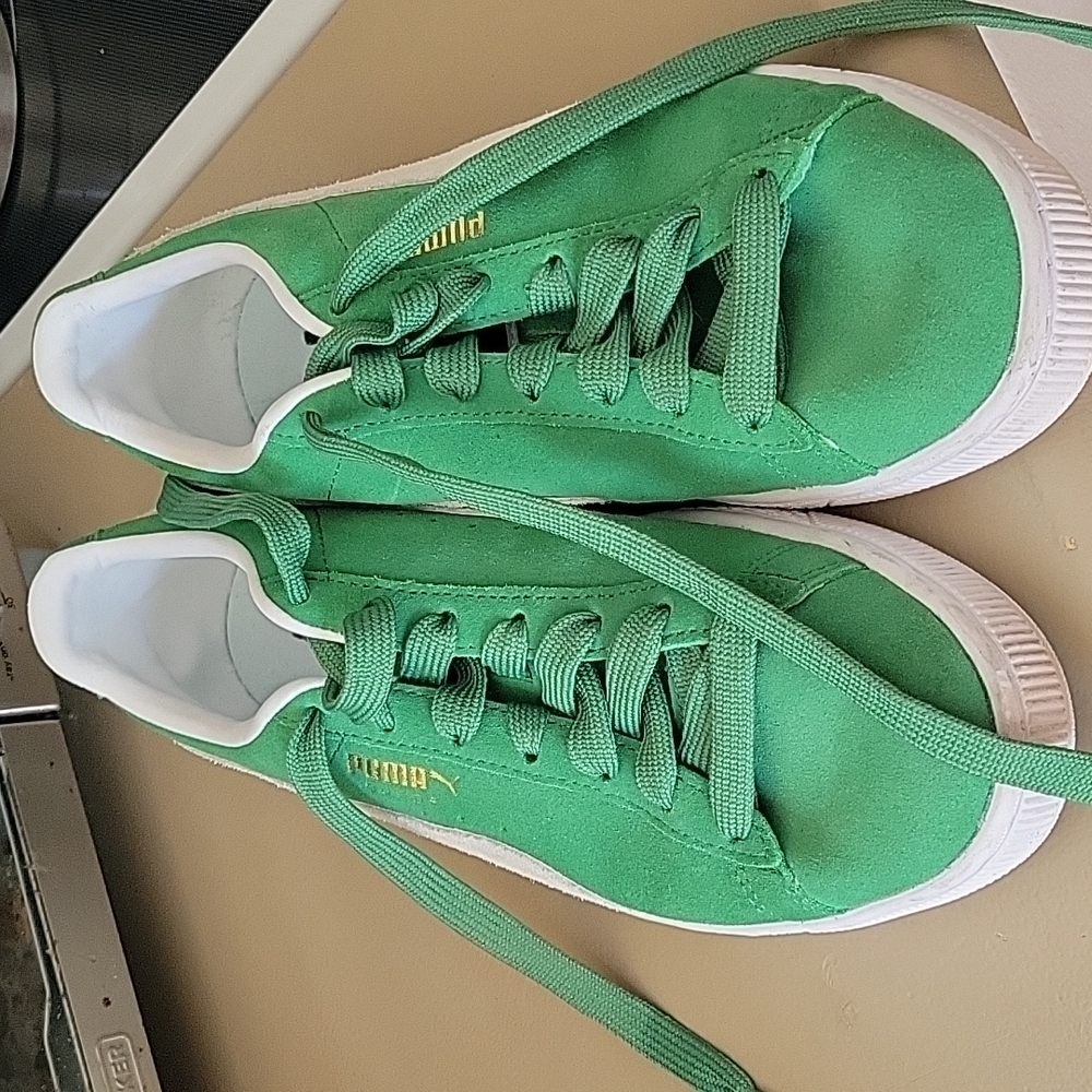 Green suede Pumas. Size 8.5 men's. Size 10 Women's.
